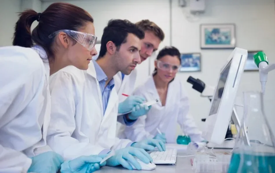 depositphotos_36184615-stock-photo-serious-researchers-looking-at-computer